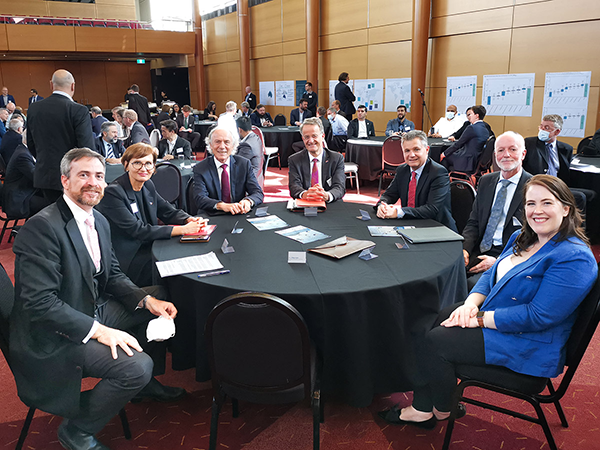 UNSW VC Professor Attila Brungs (left) sits at a table with members of a visiting delegation from Germany